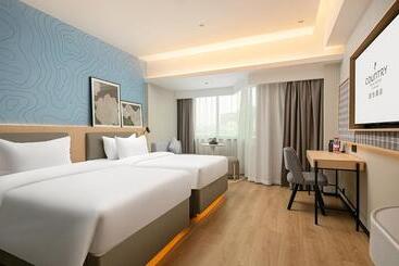 فندق Country Inn & Suite By Radisson, Guangzhou Railway Station Xiaobei