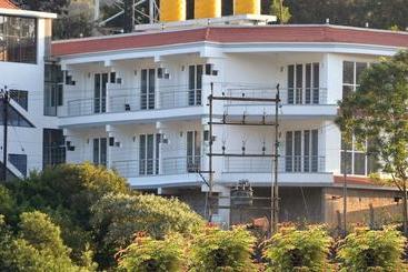 Hotell Divi Heritage Inn