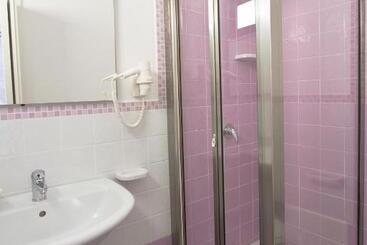 تختخواب و صبحانه Venustas