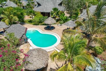 호텔 Mawimbi Bungalows