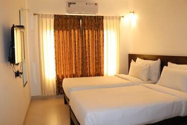 Отель Amrut Aura