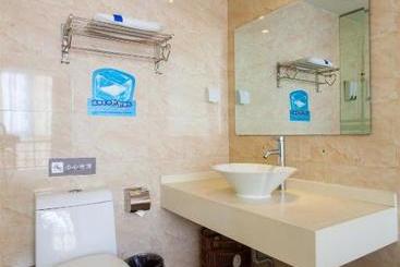 Отель Qingdao Suyue Youxiang