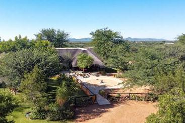 ペンション Lion's Den Guesthouse