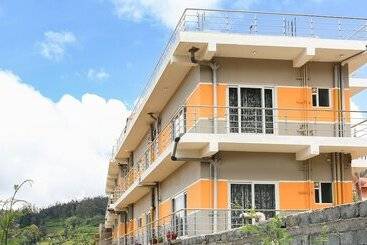 בית מלון כפרי Treebo Light House, 900 Mtrs From Botanical Garden