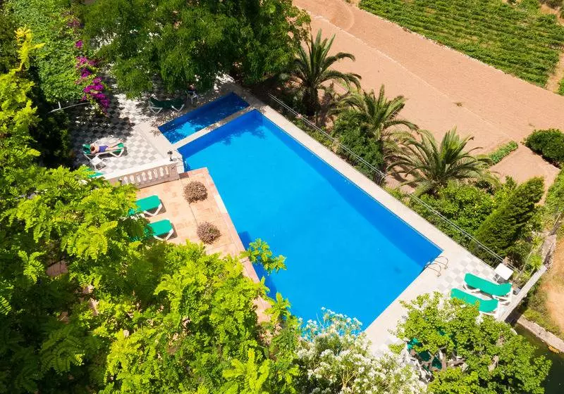 호텔 Hostal Sa Baronia