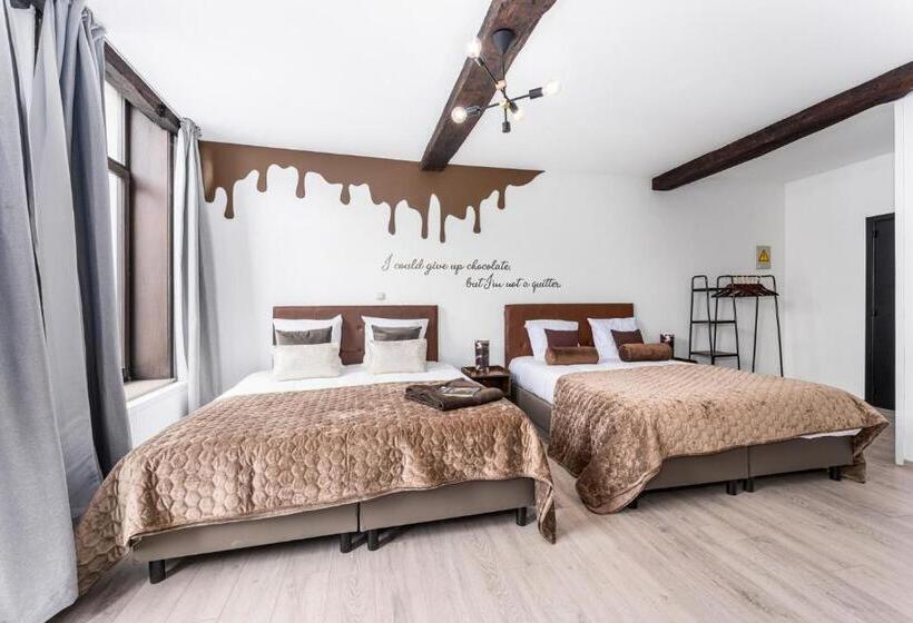 Отель The Chocolate Suites