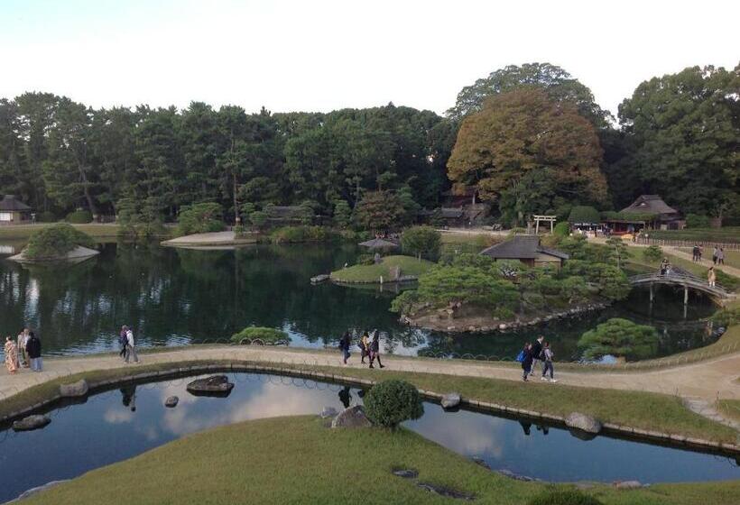 בית מלון כפרי Okayama Plaza