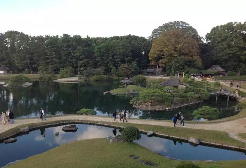 בית מלון כפרי Okayama Plaza