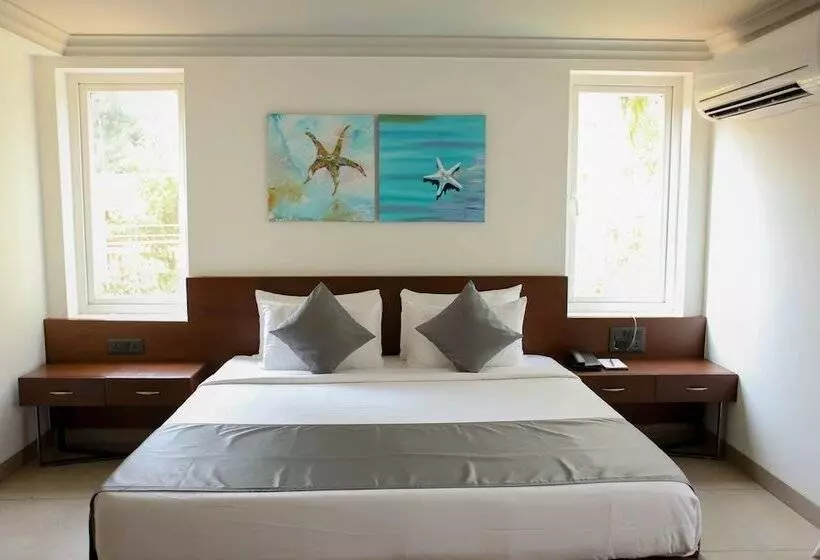 ホテル Capital O 28820 Silver Shell Resort