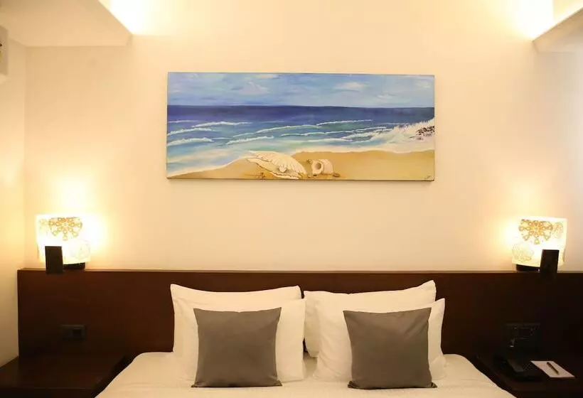 ホテル Capital O 28820 Silver Shell Resort