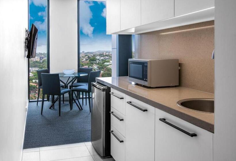 Отель Essence Suites Taringa