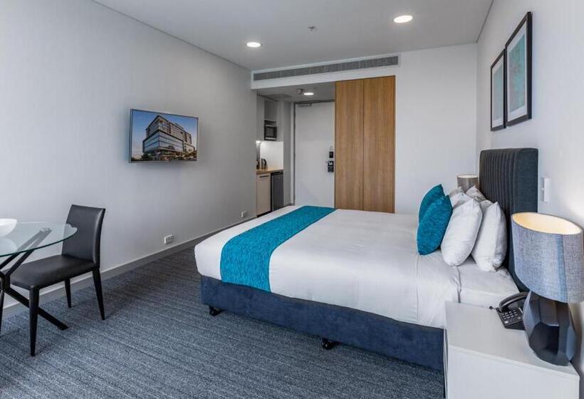 Отель Essence Suites Taringa