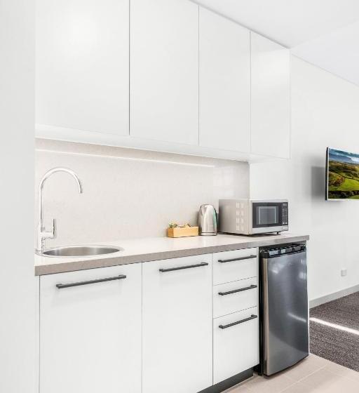 Отель Essence Suites Taringa