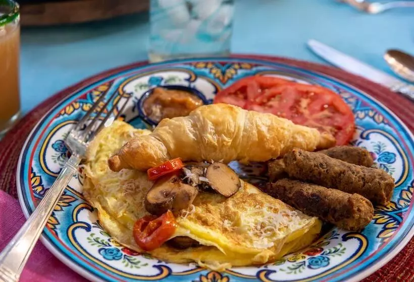 تختخواب و صبحانه Adobe Rose Inn