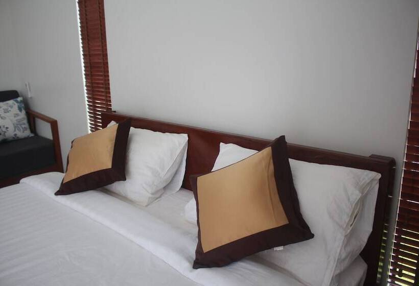 בית מלון כפרי Sandy Clay Bungalows