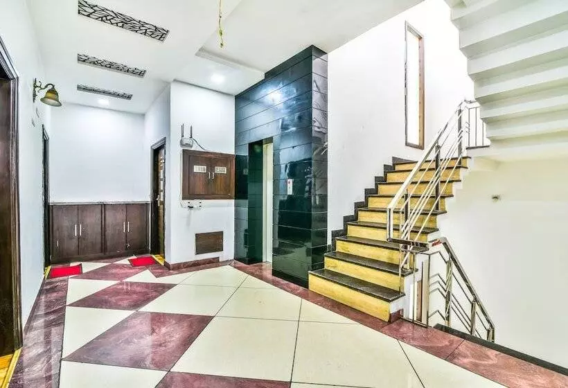 Fabhotel Aman Residency Sharifpura
