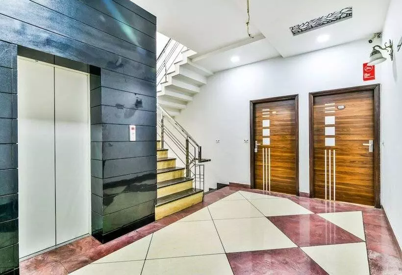 Fabhotel Aman Residency Sharifpura