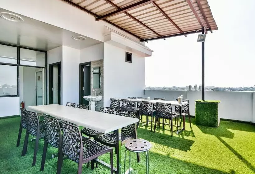 Fabhotel Aman Residency Sharifpura