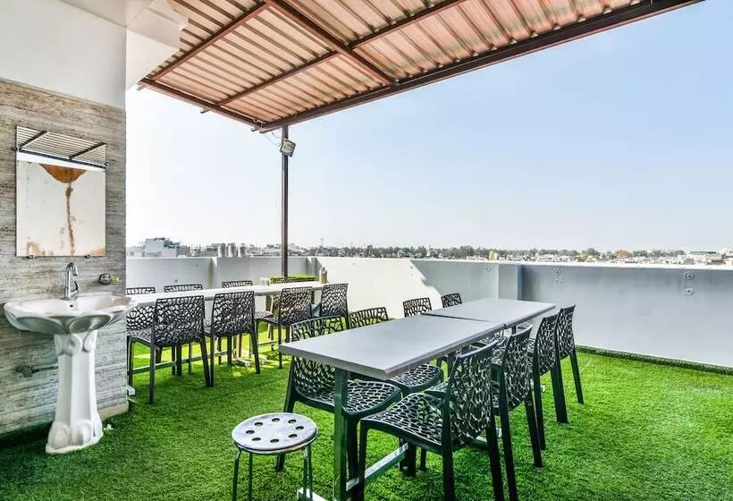 Fabhotel Aman Residency Sharifpura