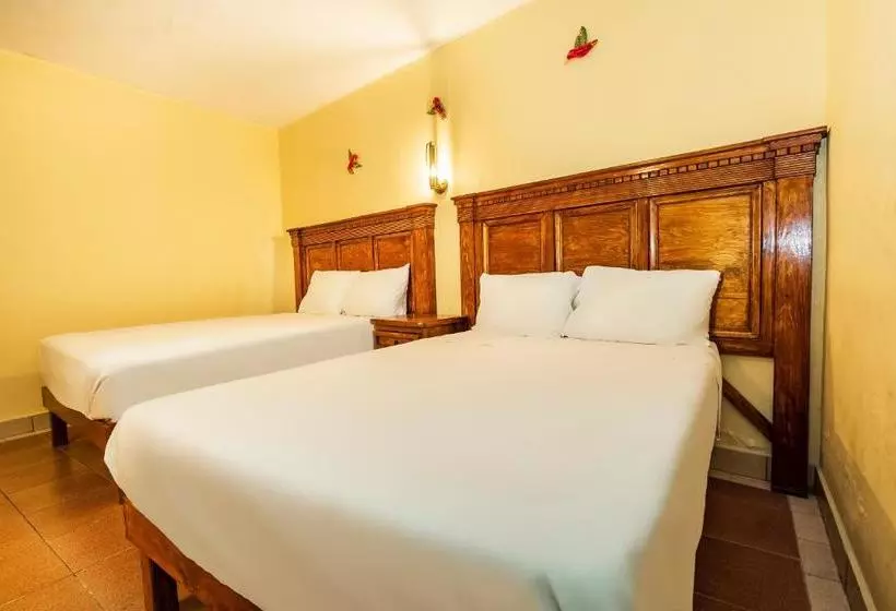 Capital O Las Calzadas  & Suites