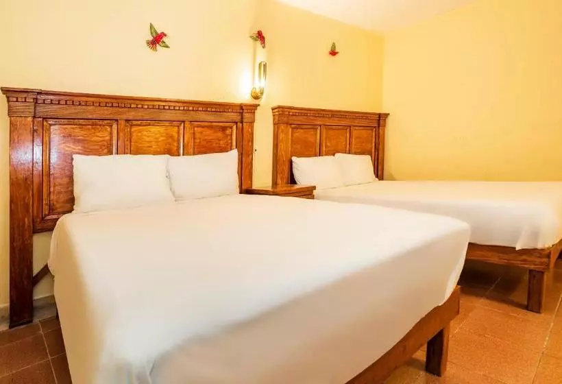 Capital O Las Calzadas  & Suites