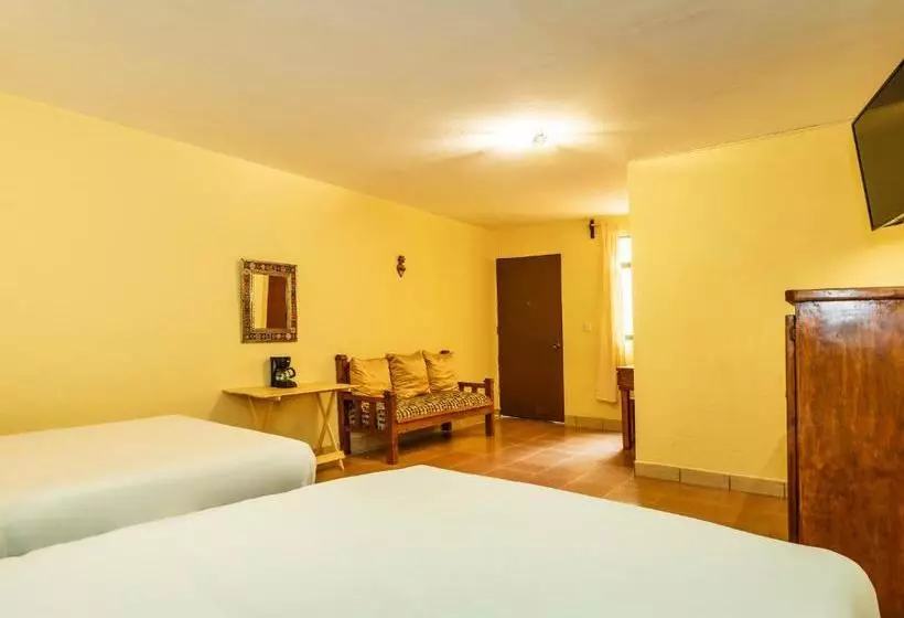 Capital O Las Calzadas  & Suites