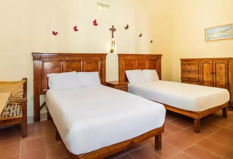 Capital O Las Calzadas  & Suites