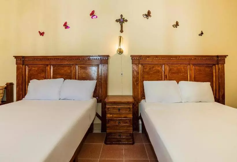 Capital O Las Calzadas  & Suites
