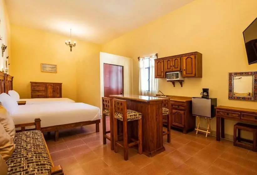 Capital O Las Calzadas  & Suites