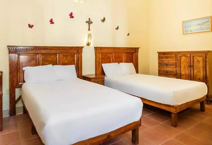 Capital O Las Calzadas  & Suites