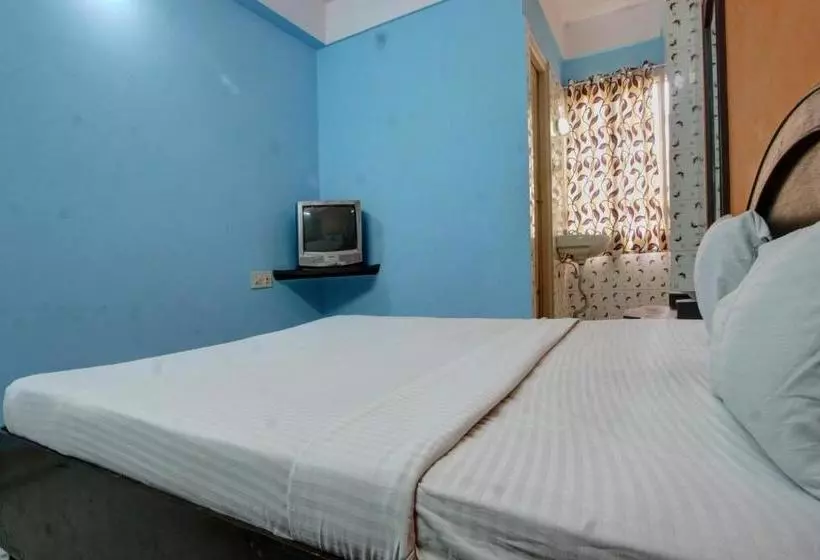 Hotelli Spot On 39787 Radha Krishna Deluxe Lodge