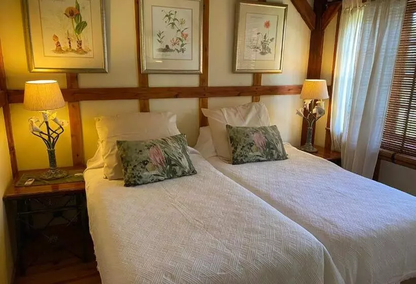 Majatalo Bohemian Garden Cottages