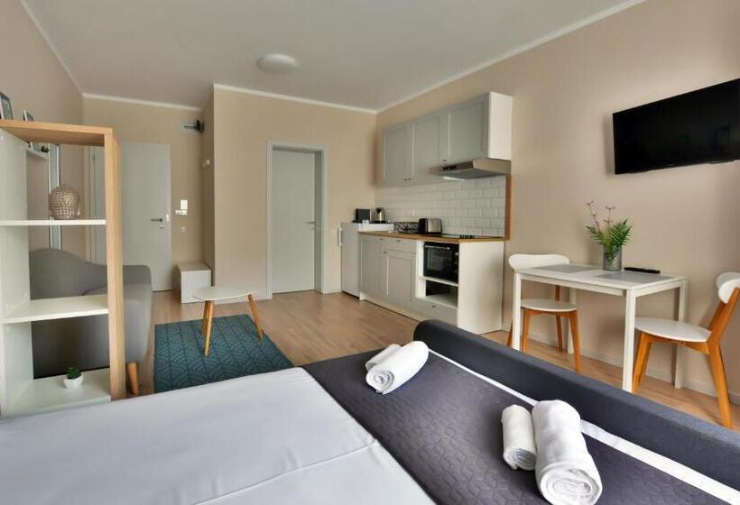 Отель Mandarin Premium Apartments