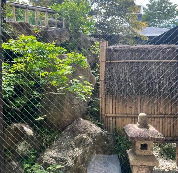 ペンション Onsen & Garden Asante Inn