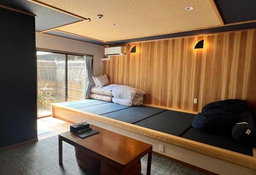 ペンション Onsen & Garden Asante Inn