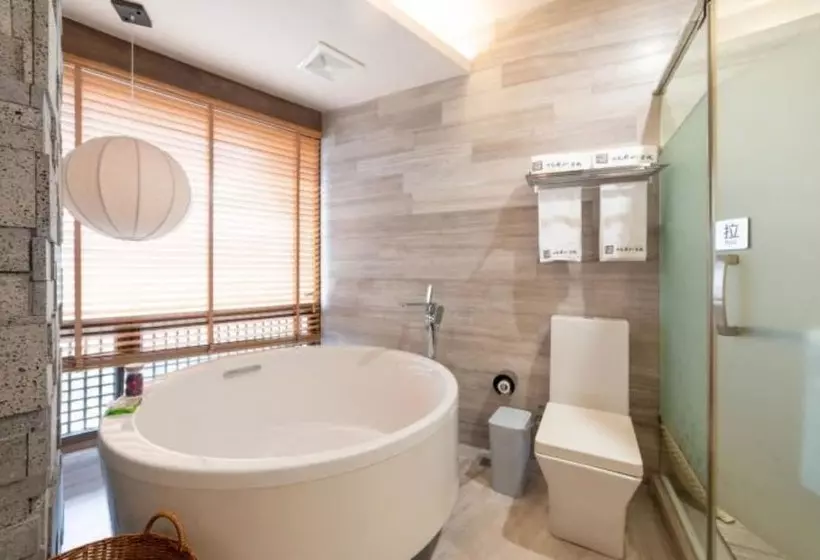 ペンション Qiansu Ban Jiang Xia Boutique Inn