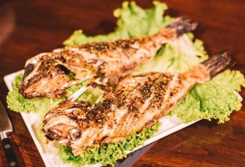 بنسيون Blue Parrot Beach Villa