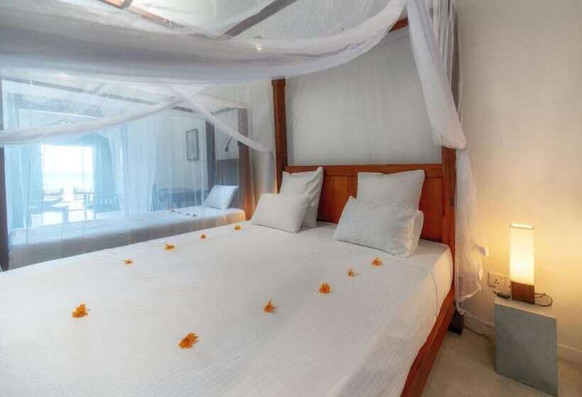 بنسيون Blue Parrot Beach Villa