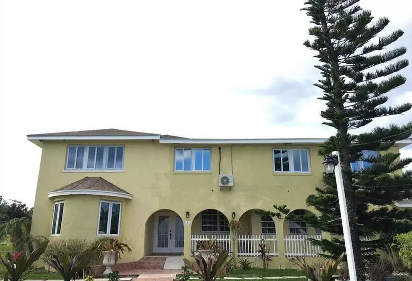 تختخواب و صبحانه Golden Palms House