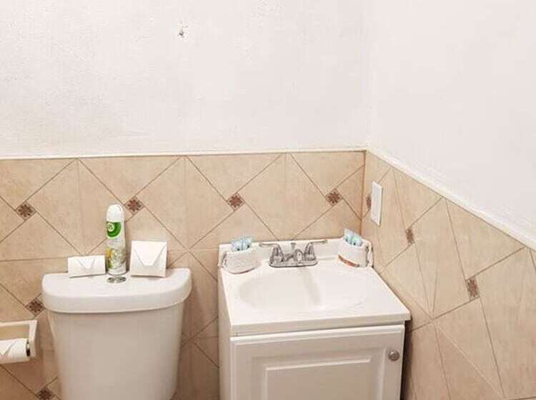 تختخواب و صبحانه Golden Palms House