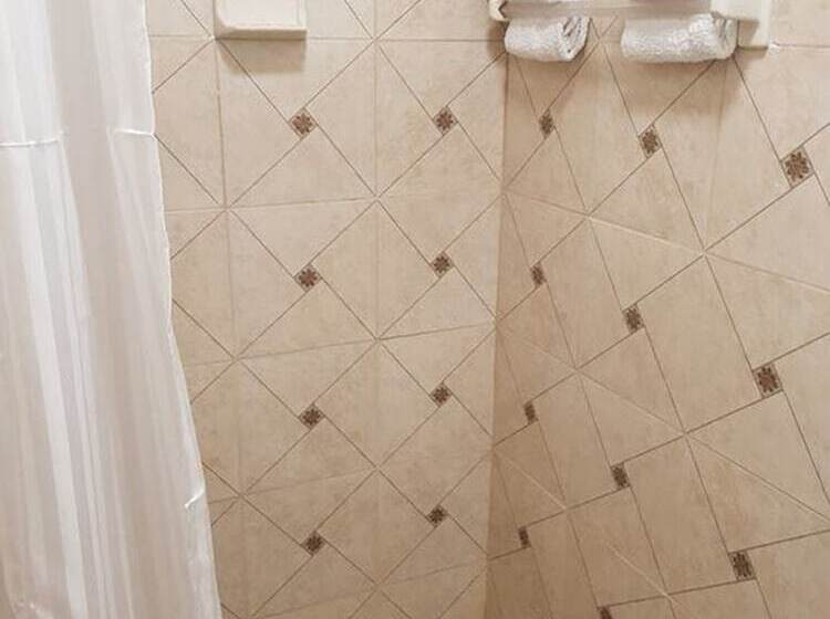 تختخواب و صبحانه Golden Palms House