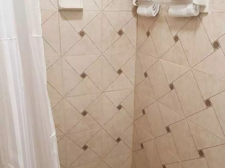 تختخواب و صبحانه Golden Palms House