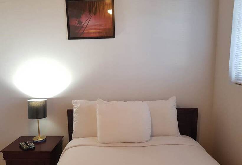 تختخواب و صبحانه Golden Palms House