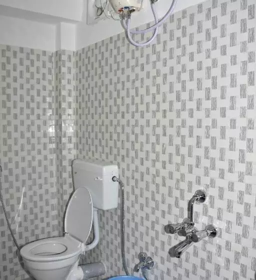 تختخواب و صبحانه The Lotus Home