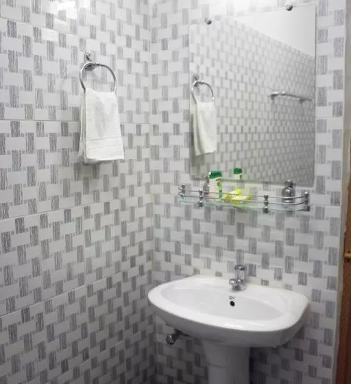 تختخواب و صبحانه The Lotus Home