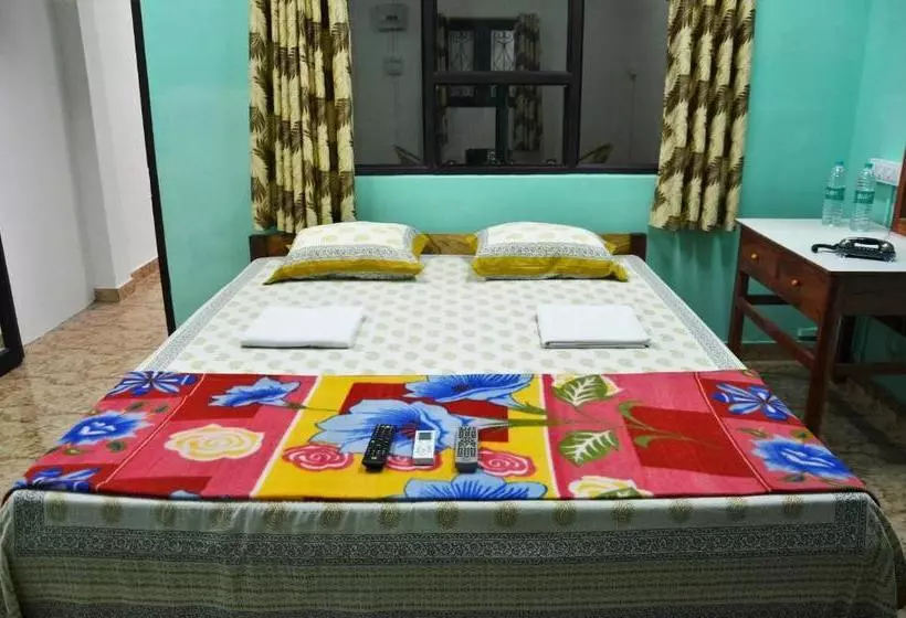 تختخواب و صبحانه The Lotus Home