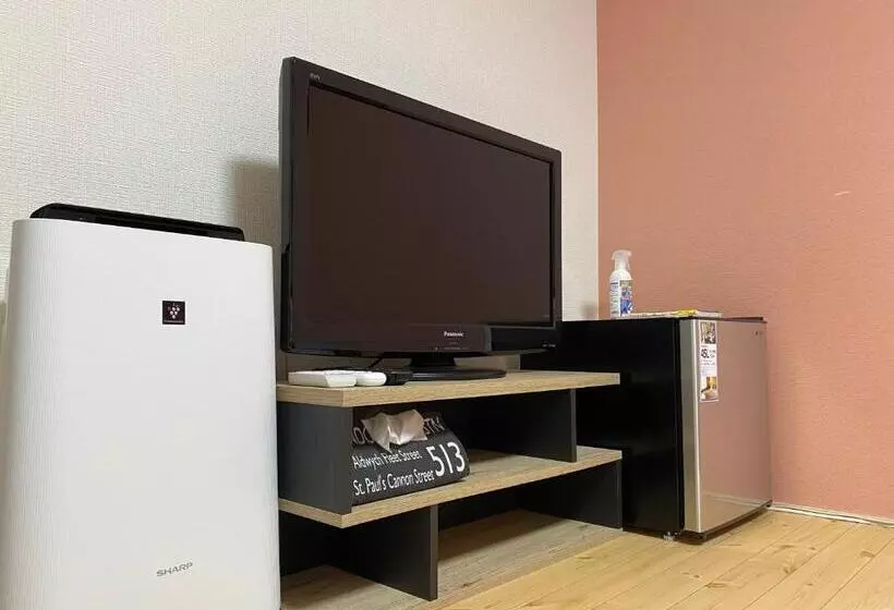 ペンション Guest House Suzumeno Kakurembo