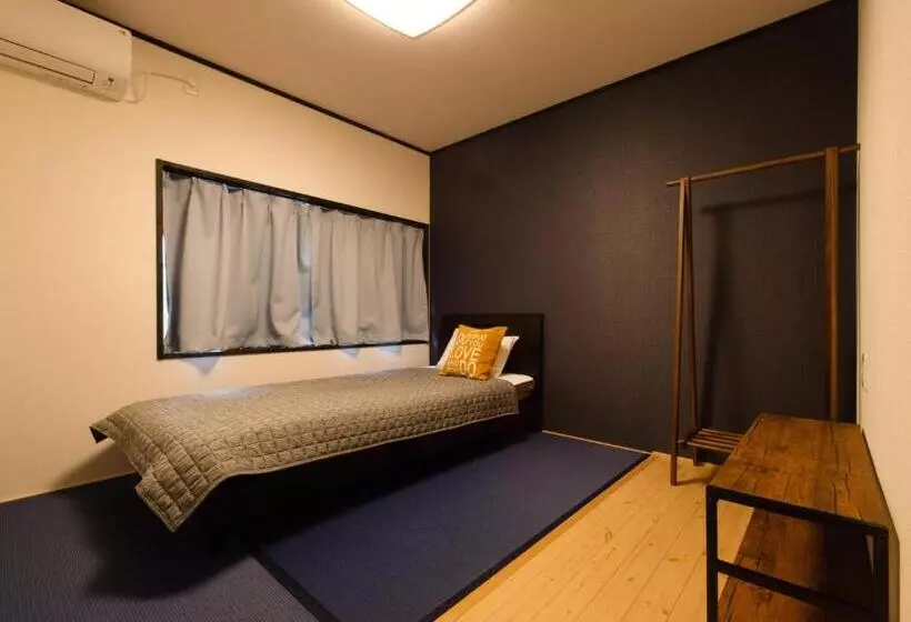 ペンション Guest House Suzumeno Kakurembo