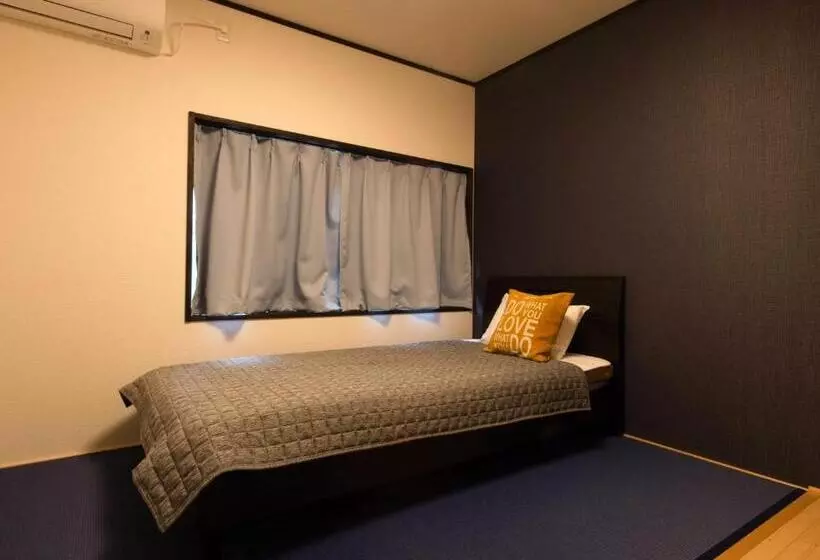 ペンション Guest House Suzumeno Kakurembo