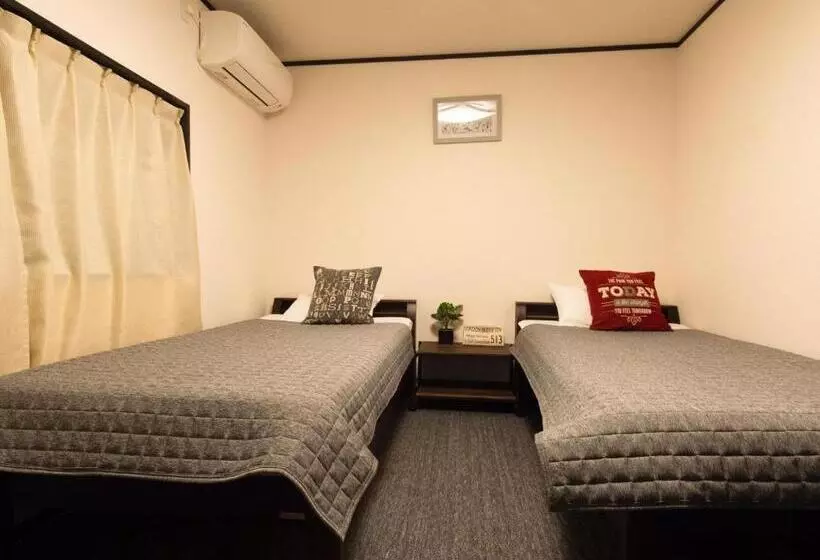 ペンション Guest House Suzumeno Kakurembo